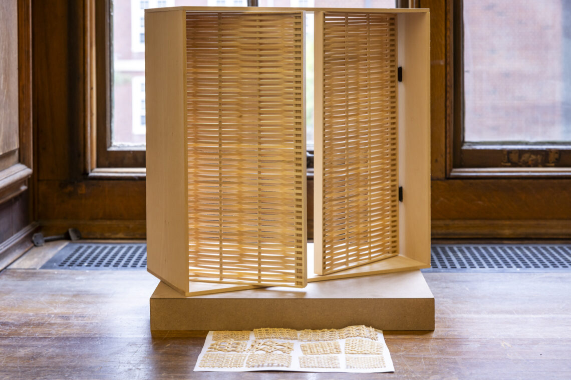 Photo of a model of a window shutter in the Ricker Library of Architecture and Art.