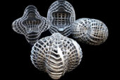 This image exhibits an a array of 3D thermal cloaking prototype designs created using 3D-printed aluminum and molded rubber.