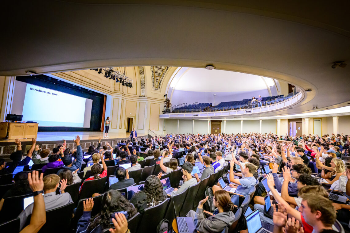 Students in an academic auditorium at the University of Illinois Urbana-Champaign