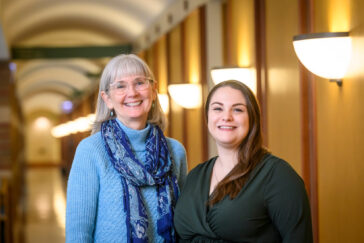 Photo of researchers in a hallway at Beckman.